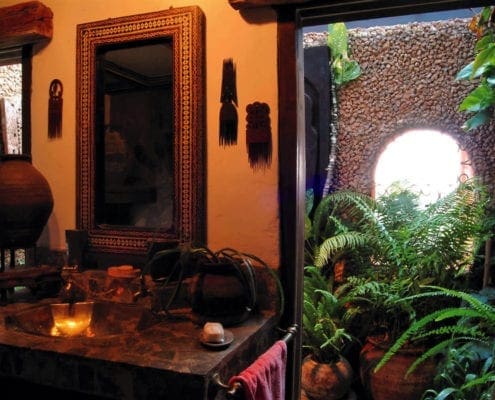 Lamu suite bathroom with interior garden.