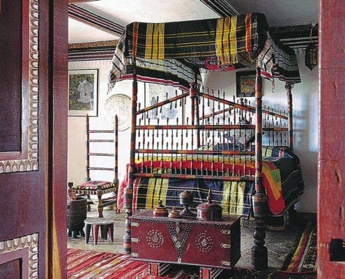 Lamu suite with 19th century Swahili bed.